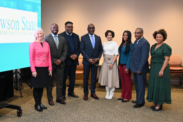 Birmingham education leaders smiling at the camera